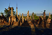 Inle Lake Myanmar. Indein, on the summit of a hill the  Shwe Inn Thein Paya a cluster of hundreds of ancient stupas. Many of them are ruined and overgrown with bushes. 